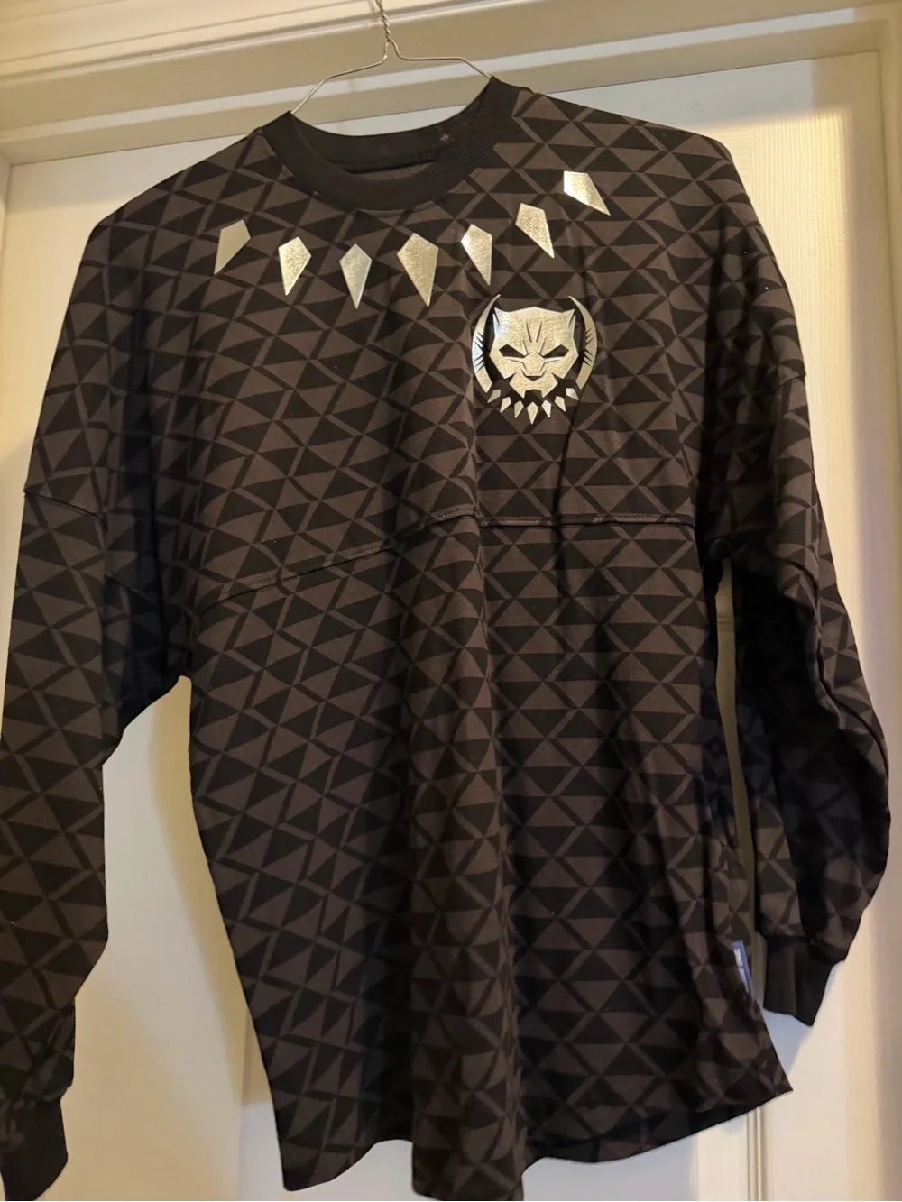 Men's Black Crewneck Sweater with Silver Emblem